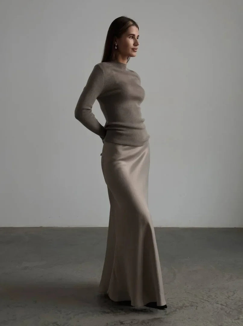 Women's sophisticated long fishtail skirt, high-waist evening fashion statement.