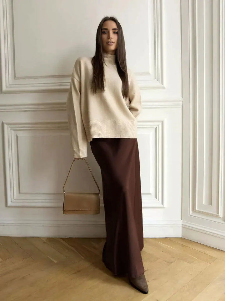 Women's stunning gala outfit: elegant high-waist fishtail maxi skirt, luxurious fabric.