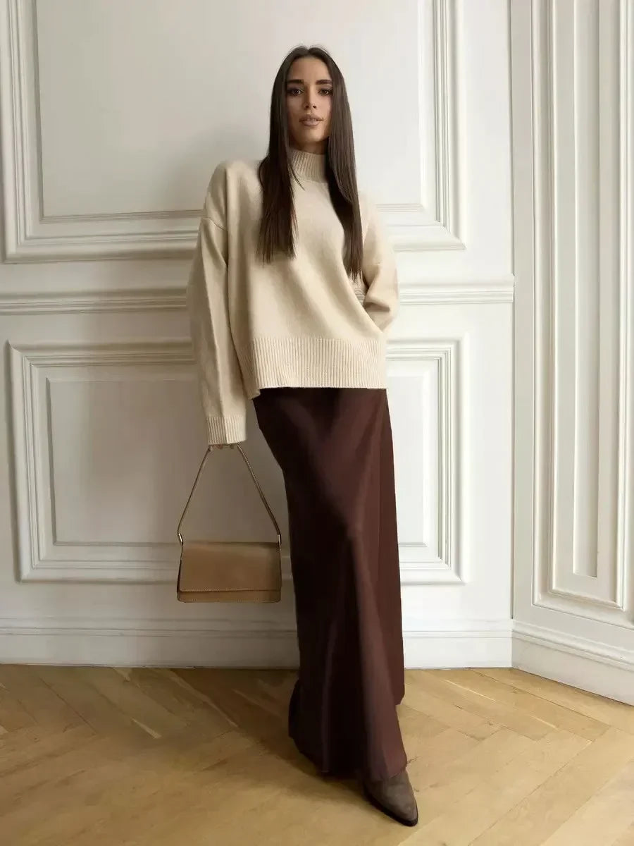 Dramatic fishtail maxi skirt, high-waist design, elegant women's evening attire.