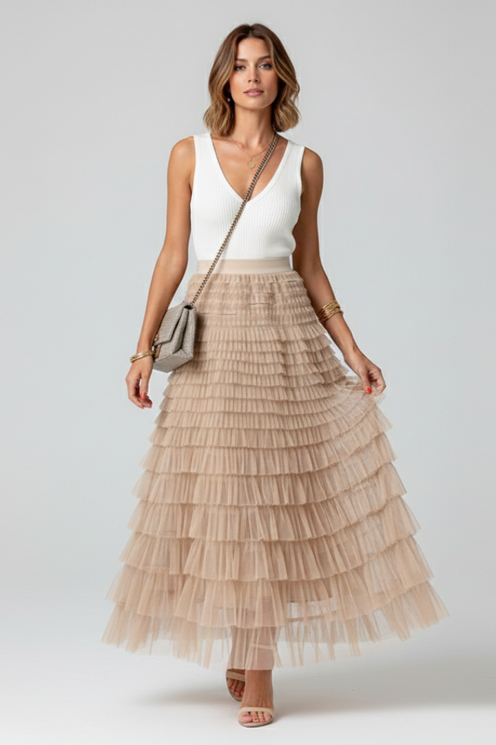 Flowy A-line tiered ruffle midi skirt for women, ideal for party wear or wedding guests.