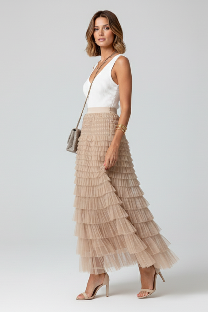 Stylish women's tiered ruffle midi skirt featuring a flattering high waist, an elegant, flowy design.