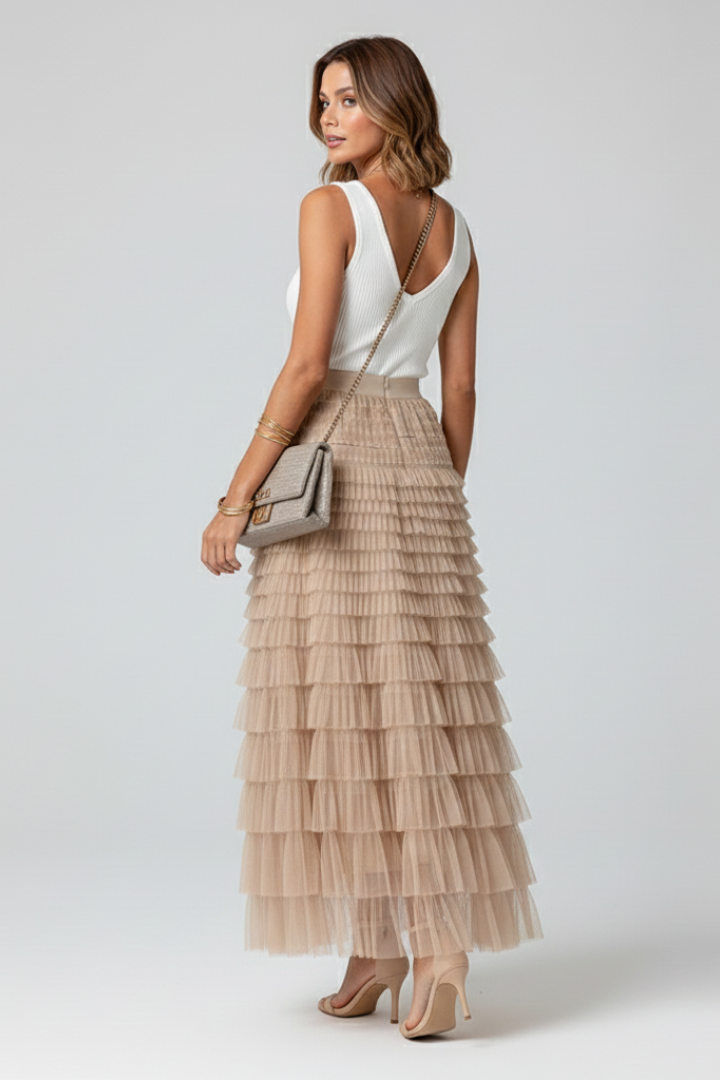 Versatile elegant high-waist women's midi skirt with a beautiful tiered ruffle design for any occasion.
