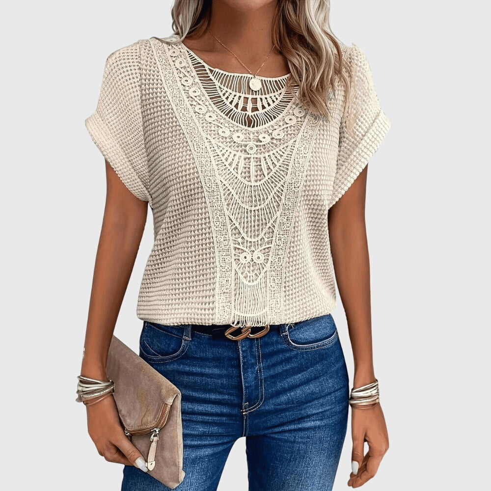 Elegant women's Ibiza style blouse with delicate lace details. Perfect for summer fashion.