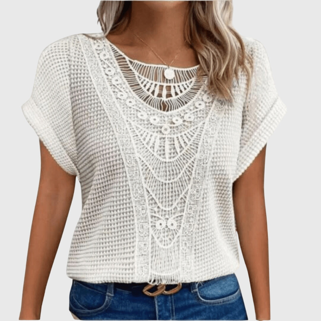 Elegant women's Ibiza style lace top, a breathable & comfortable summer blouse for resort wear.