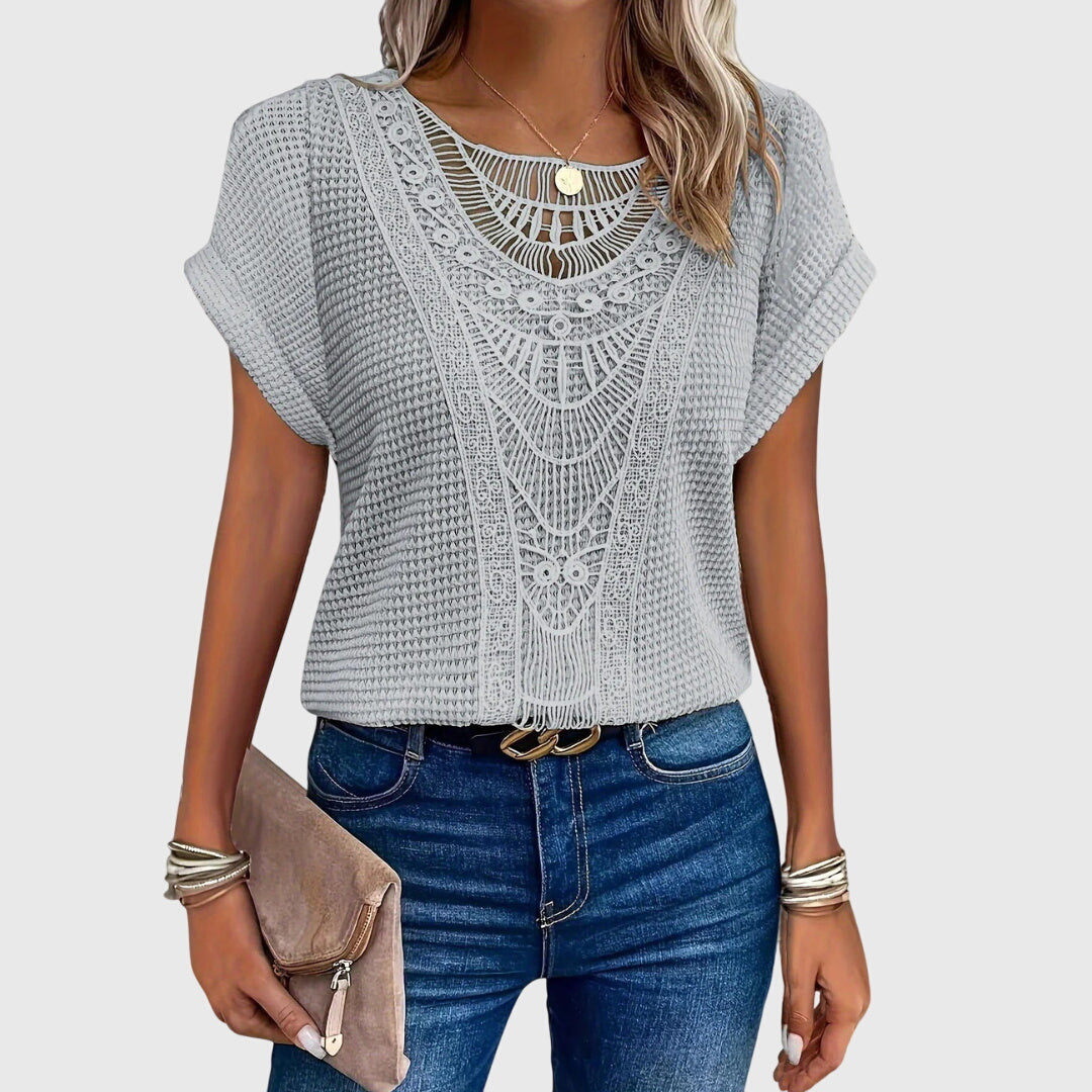 Ladies' elegant Ibiza style lace blouse, ideal for resort wear and summer outings.