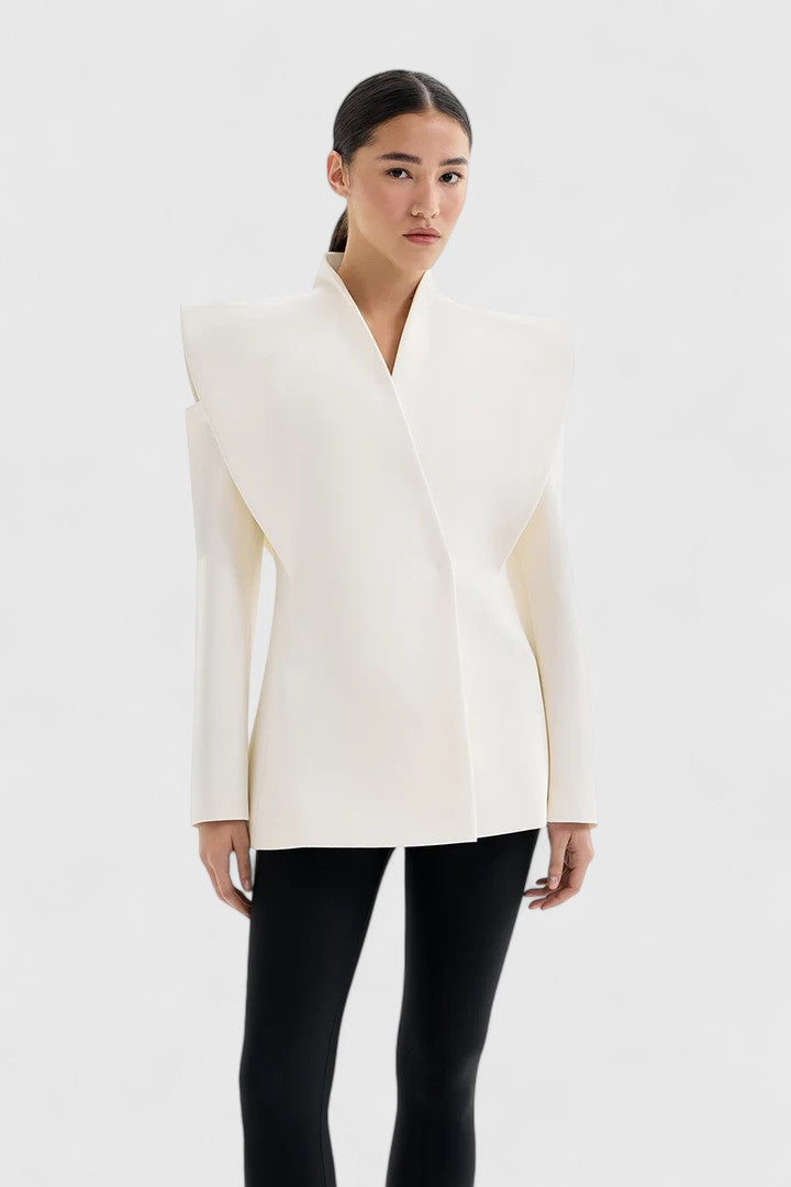 Elegant women's ivory tailored blazer with sleek structured shoulders, perfect for professional or chic fashion wear.