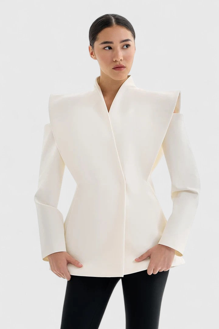 Statement ivory women's blazer with structured shoulders, offering a sophisticated and modern tailored look.
