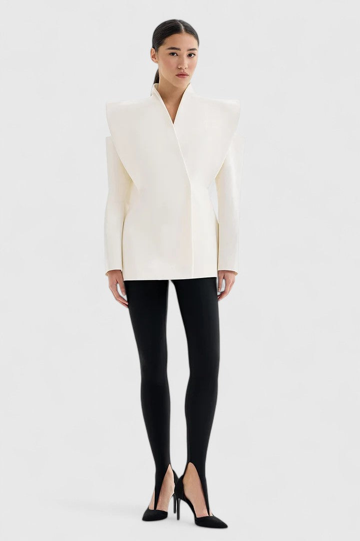 Fashion-forward women's ivory blazer, a sleek tailored jacket featuring sophisticated structured shoulders and clean lines.
