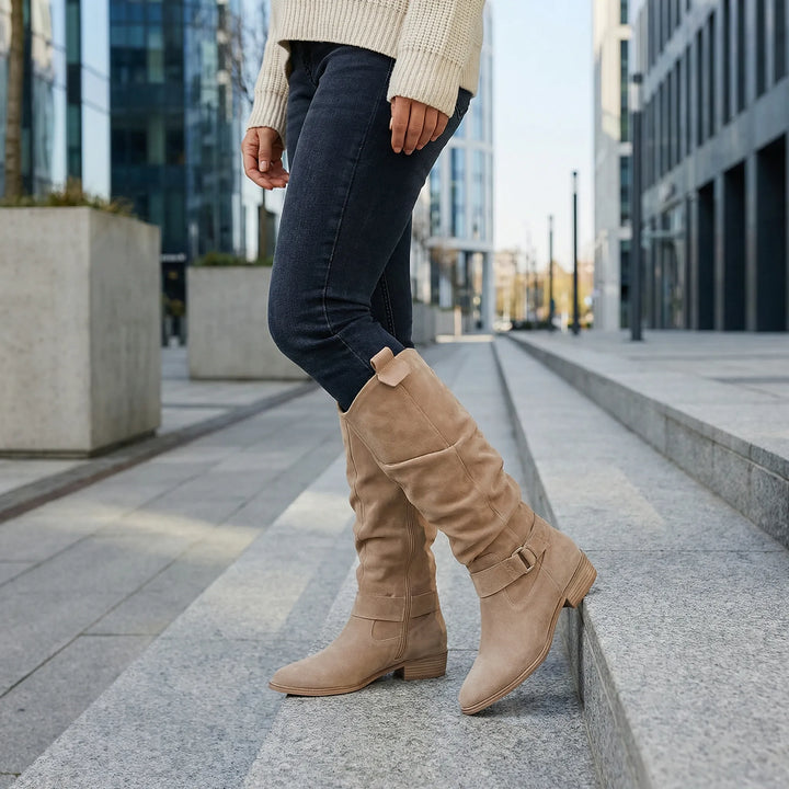 Elegant women's knee-high boots with side zipper, block heel. Perfect for fall & winter fashion.