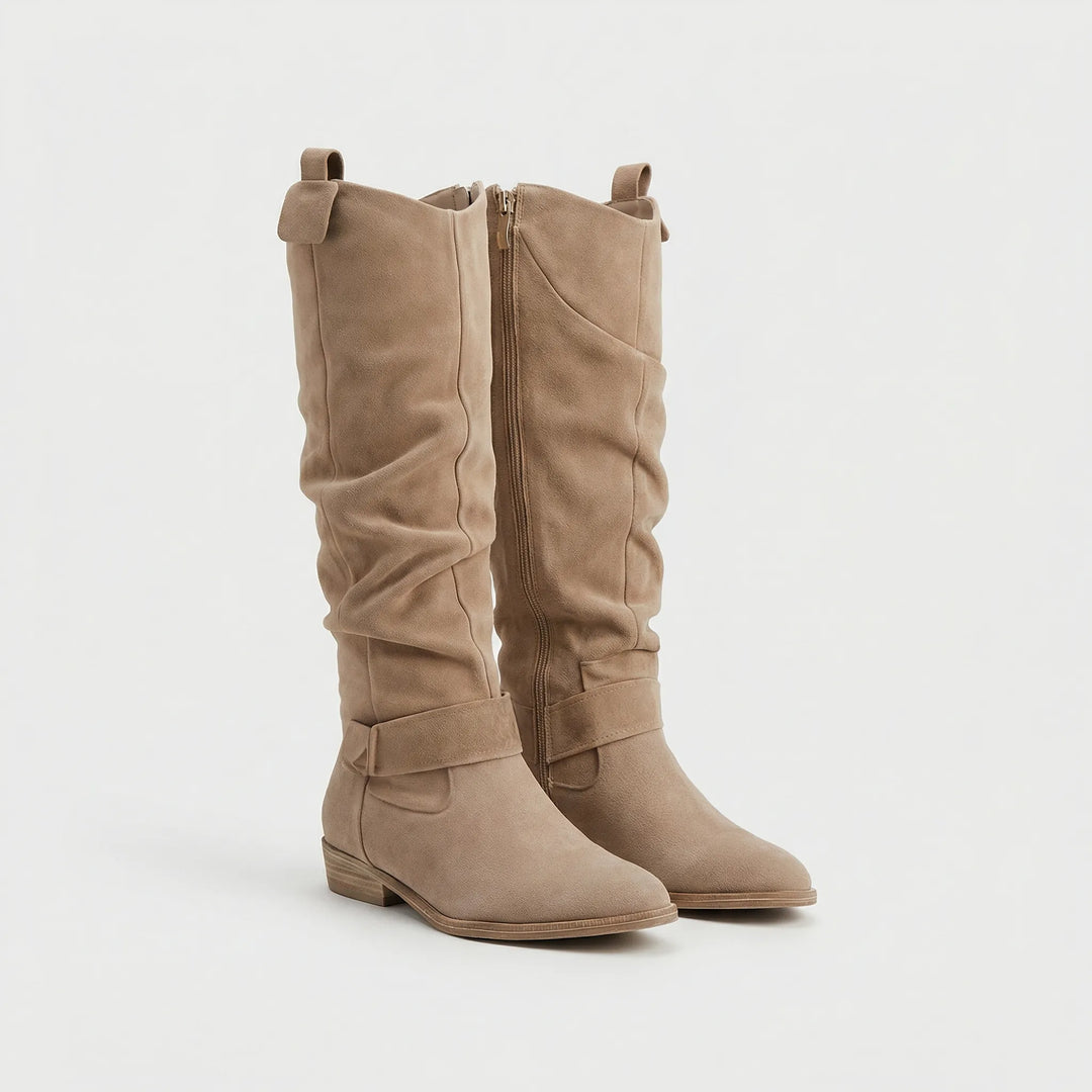 Chic knee-high Chantal boots for women. Features elegant bow detail, comfortable slip-resistant design.