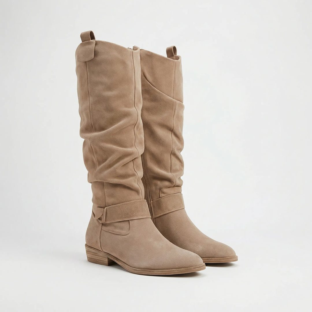 Fashionable women's knee-high boots with elegant silhouette & practical side zipper. Great for any occasion.