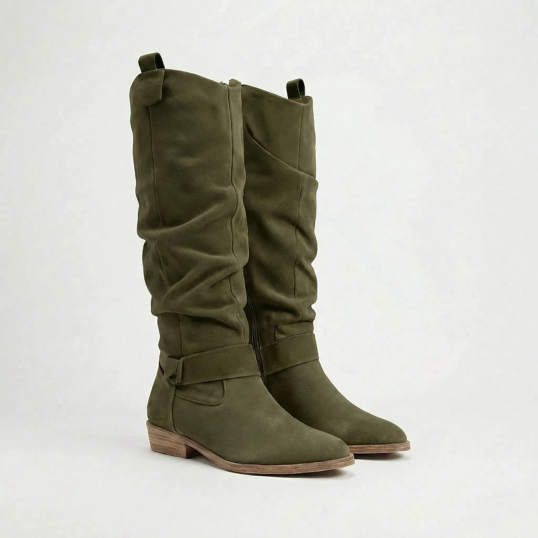 Comfortable women's knee-high boots. Features a stable block heel, chic bow detail, and easy side zipper.