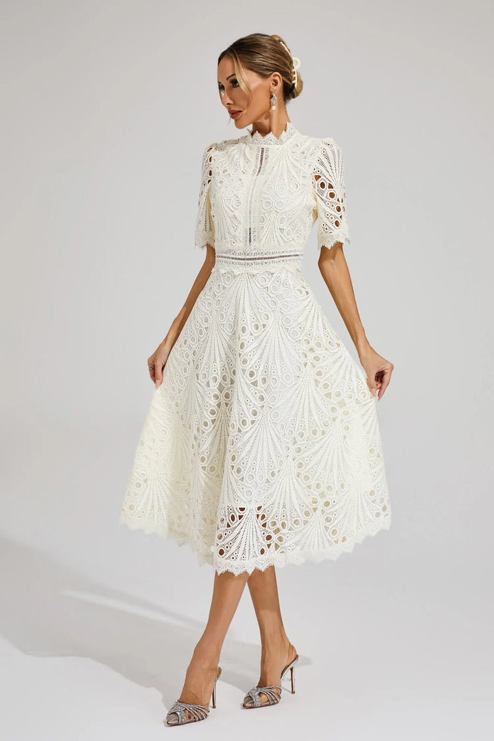 Elegant women's lace midi dress, perfect for weddings & special occasions. Feminine tailored fit.