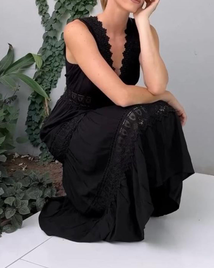 Full shot of a woman wearing an elegant sleeveless A-line lace midi dress, perfect for any event.