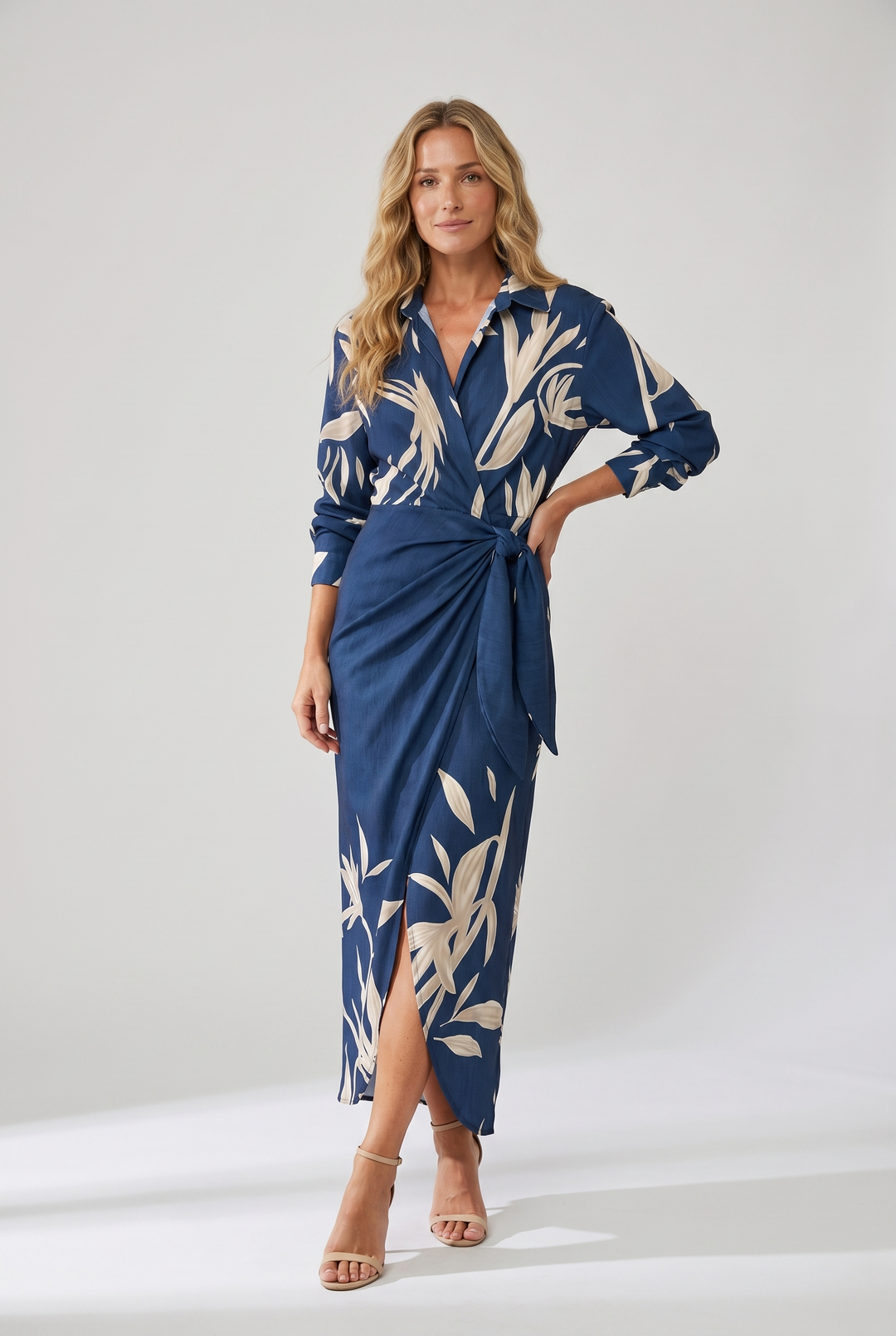 Women's stylish leaf print wrap maxi dress, featuring a collared v-neck, long sleeves & side slit.