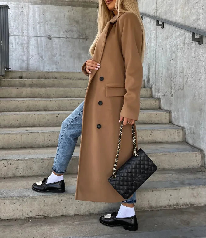 Chic women's long trench coat with structured, tailored fit & elegant belt. Versatile for office & winter style.