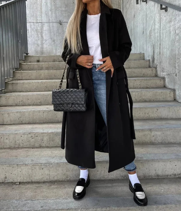 Elegant women's long belted coat, a versatile trench for a chic, tailored office or fall/winter look. Structured.