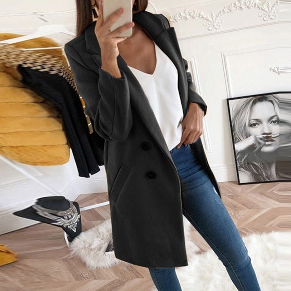 Elegant women's long blazer coat, a chic and sophisticated layering piece for professional women's fashion.