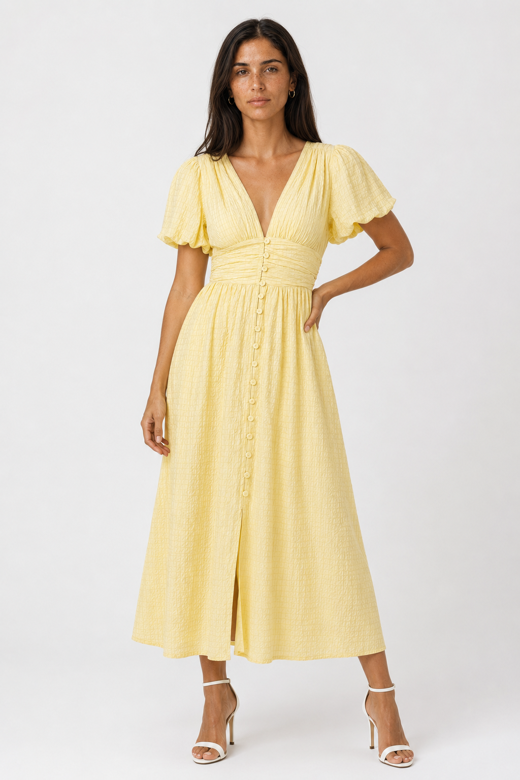 Flowy vintage-style women's maxi dress with chic puff sleeves, ideal for a feminine, elegant look.