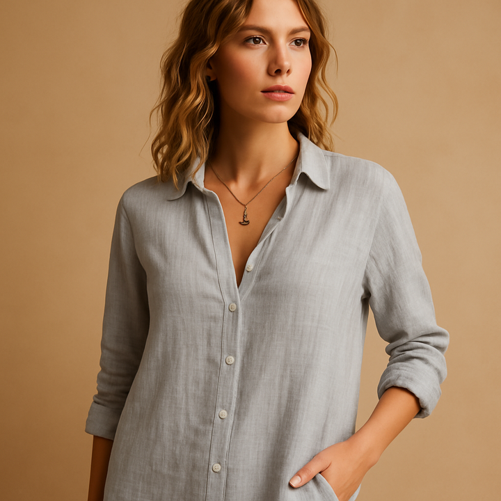 Modern women's elegant long-sleeve blouse with a lapel collar and full button placket, perfect for sophisticated business casual outfits.