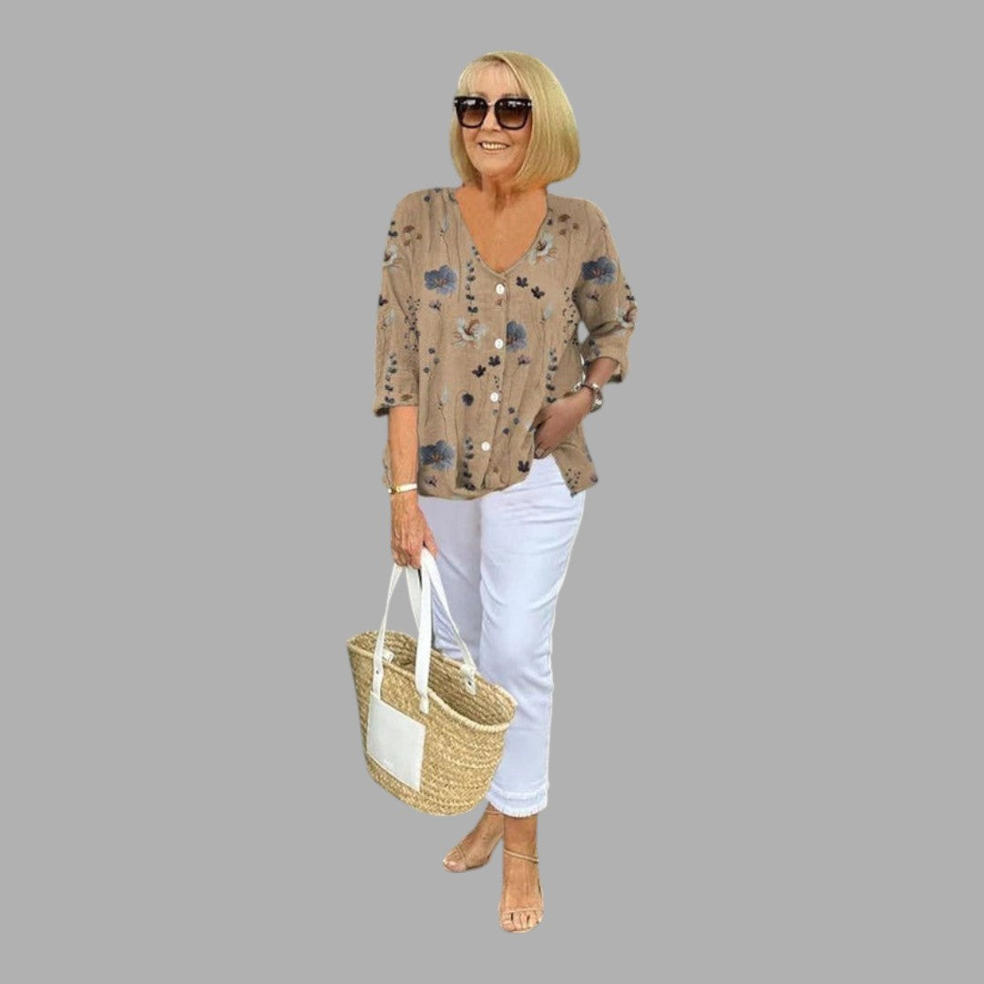 Feminine long sleeve floral top with delicate print, an elegant women's blouse ideal for comfortable spring & summer style.