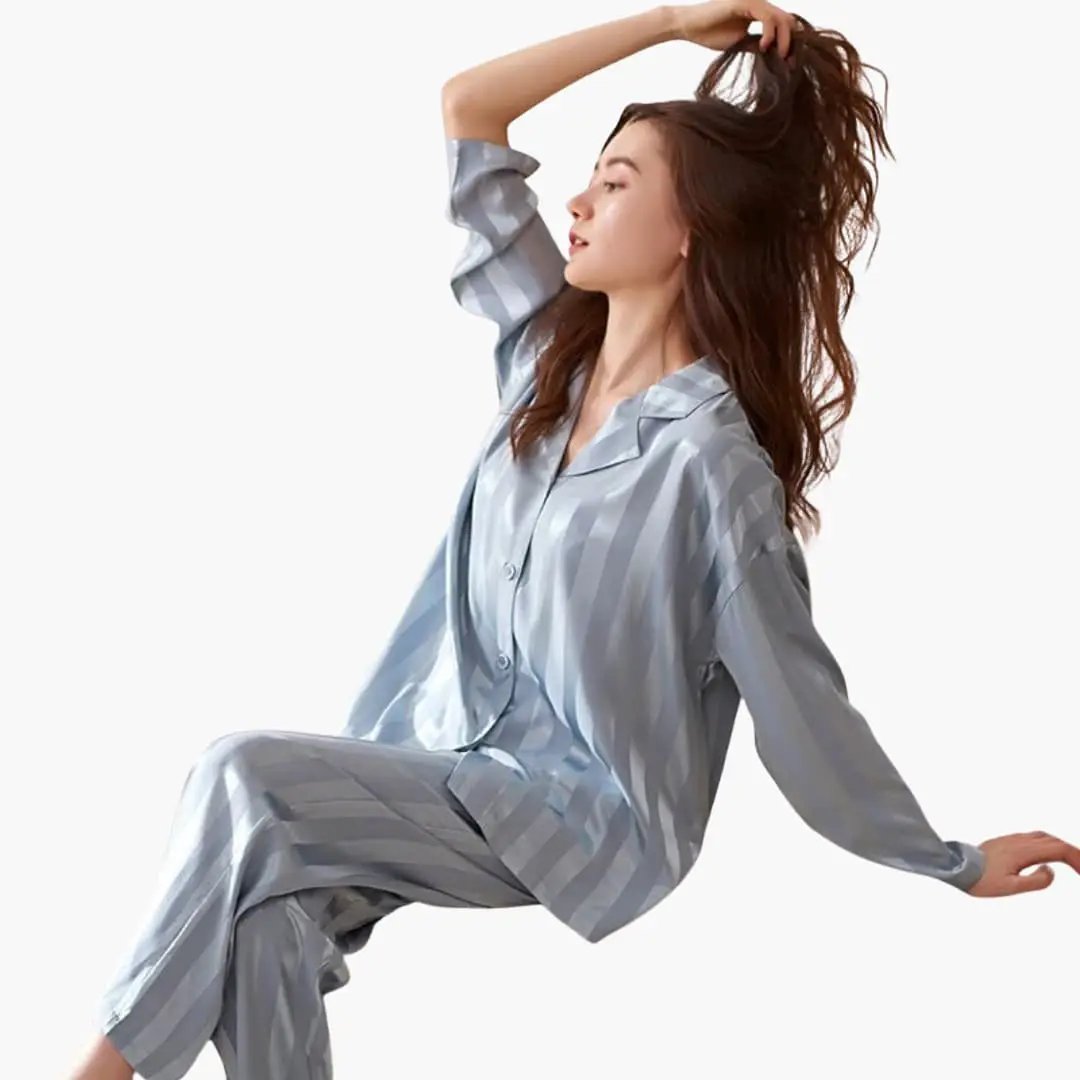Comfortable women's two-piece long sleeve wide leg pajama set. Perfect elegant loungewear for sleep or relaxation.