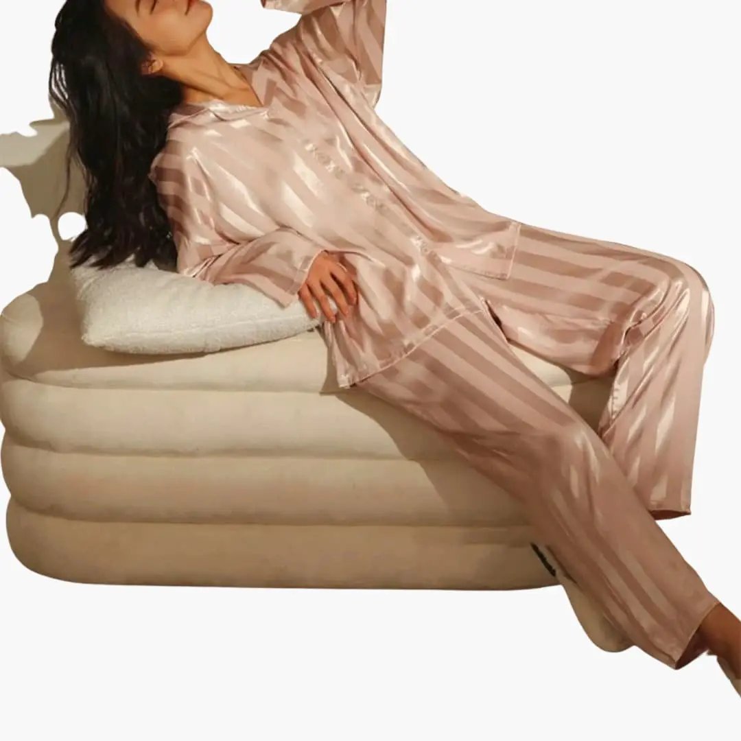 Stylish women's long sleeve pajama set with wide leg pants. Elegant two-piece sleepwear, perfect comfortable loungewear.