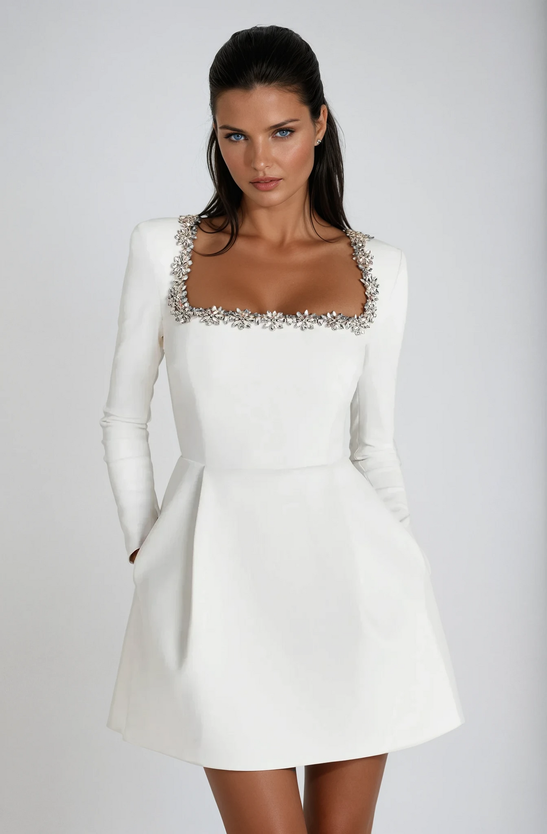 Stylish women's long sleeve mini dress, versatile for elegant party wear or a formal occasion.