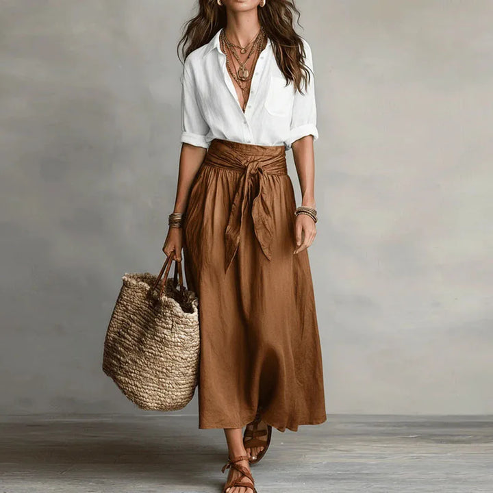 Chic women's matching long sleeve skirt set, a versatile two-piece outfit for elegant office attire or casual events.
