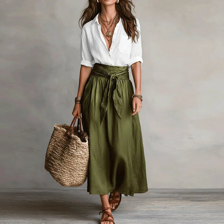 Sophisticated women's long sleeve top and skirt co-ord set, an elegant two-piece for stylish fashion versatility.