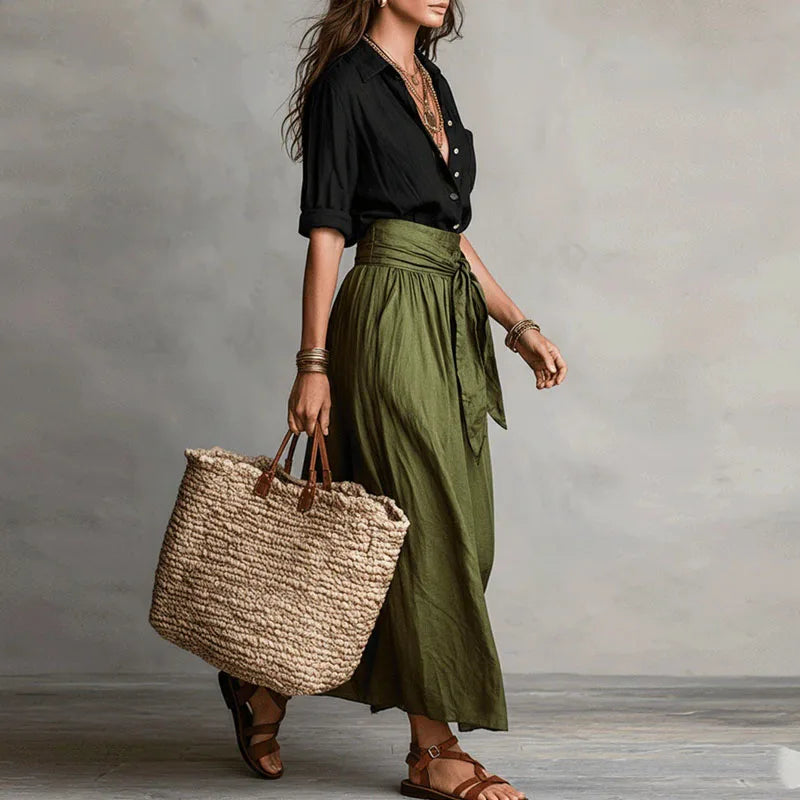 Women's long sleeve elegant top and matching skirt two-piece set, a stylish co-ord for versatile fashion needs.