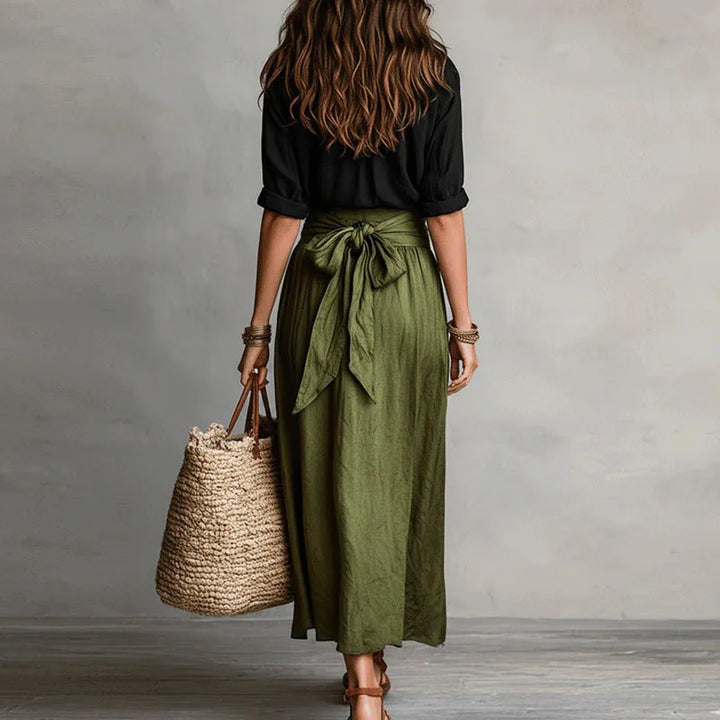 Elegant women's long sleeve skirt co-ord set. Stylish two-piece outfit with tie-waist, perfect for versatile wear.
