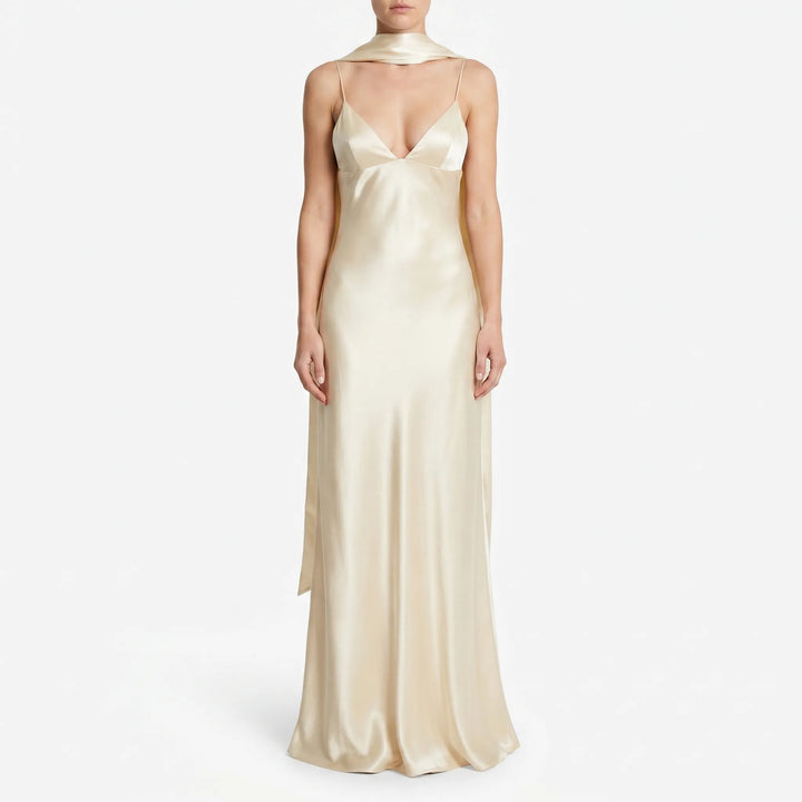 Sophisticated women's long evening slip dress with a graceful open back, V-neck, and chic scarf detail.