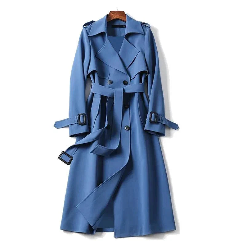 Elegant women's long trench coat with double-breasted design & tie belt. Perfect for fall office wear.