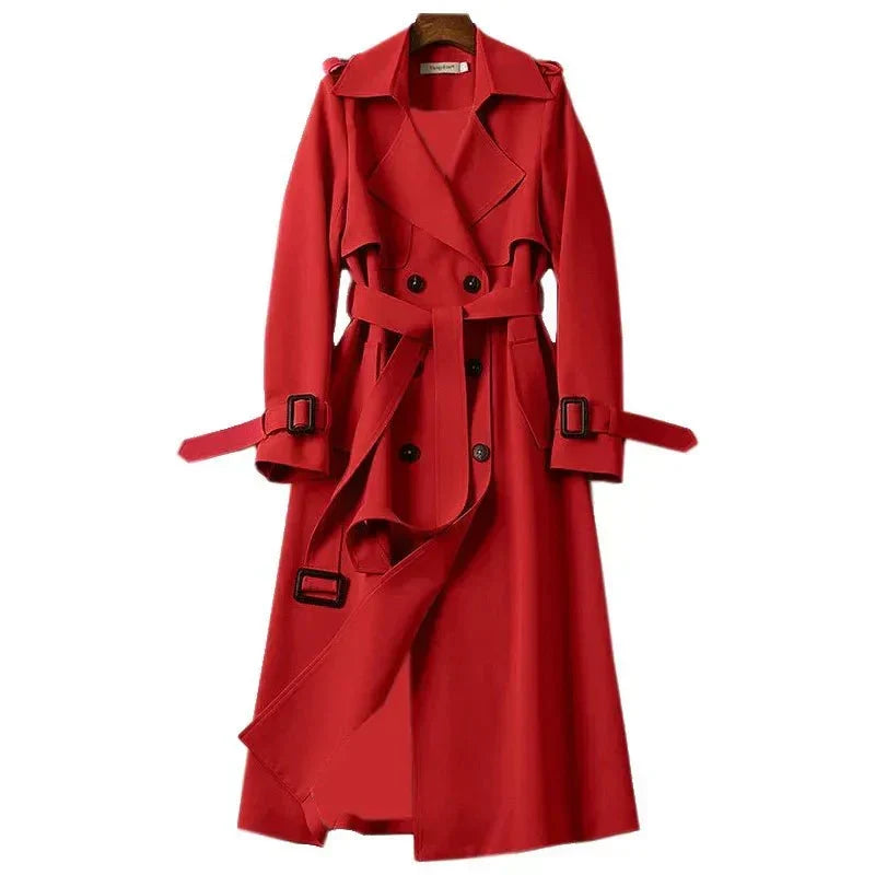 Women's double-breasted long trench coat with a chic tie belt. Elegant outerwear, perfect for fall and office style.