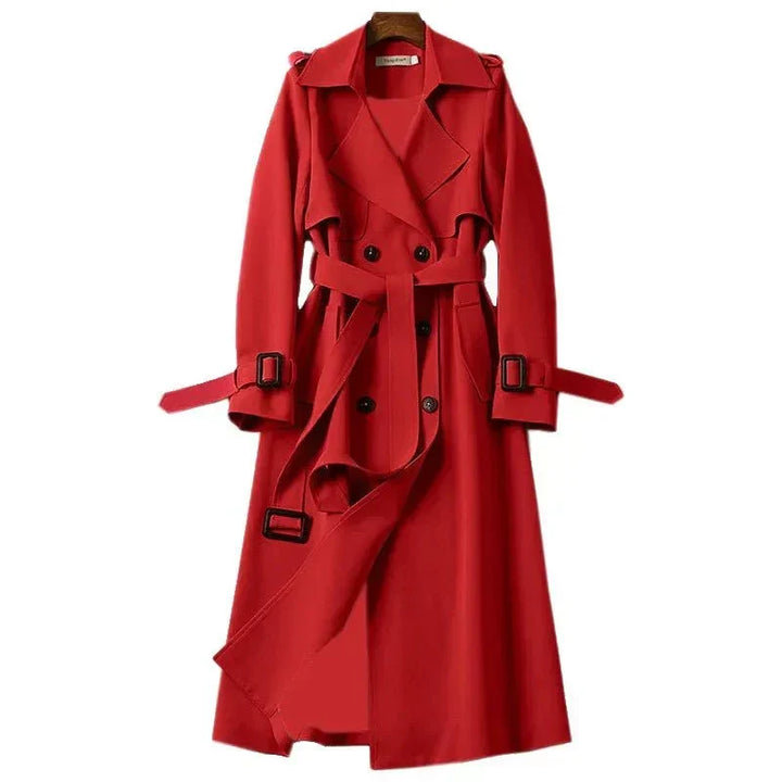 Women's double-breasted long trench coat with a chic tie belt. Elegant outerwear, perfect for fall and office style.