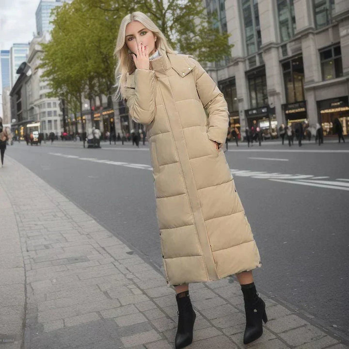 Cozy long winter coat for ladies, offering warmth and a timeless, stylish look.