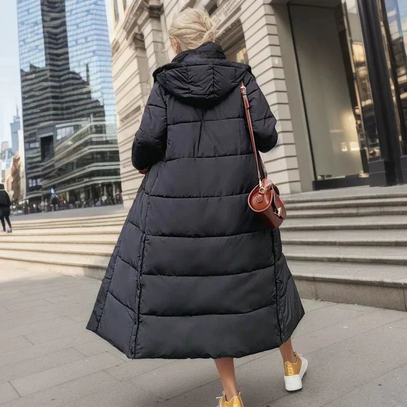 Warm & stylish women's long winter coat, perfect for elegant cold-weather fashion.