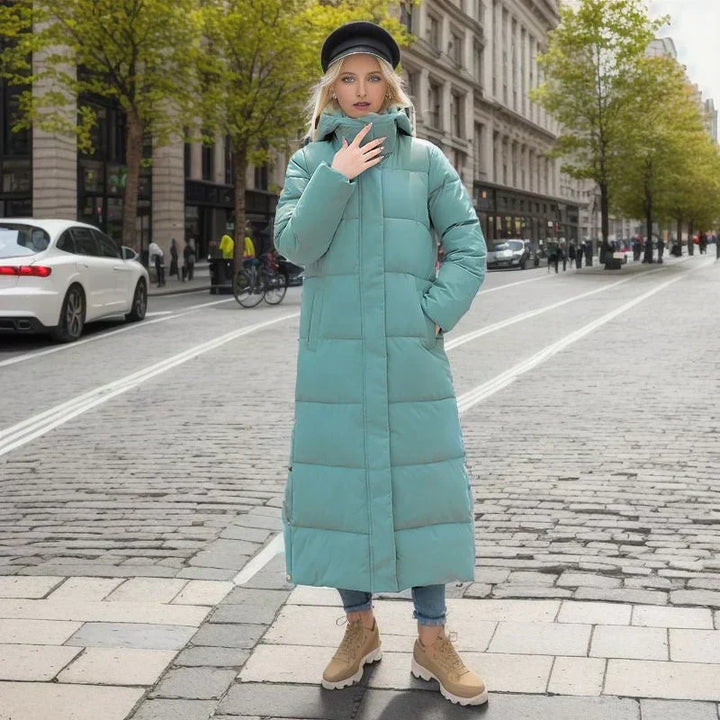 Stylish ladies' long winter coat, essential for warmth and fashion in cold weather.