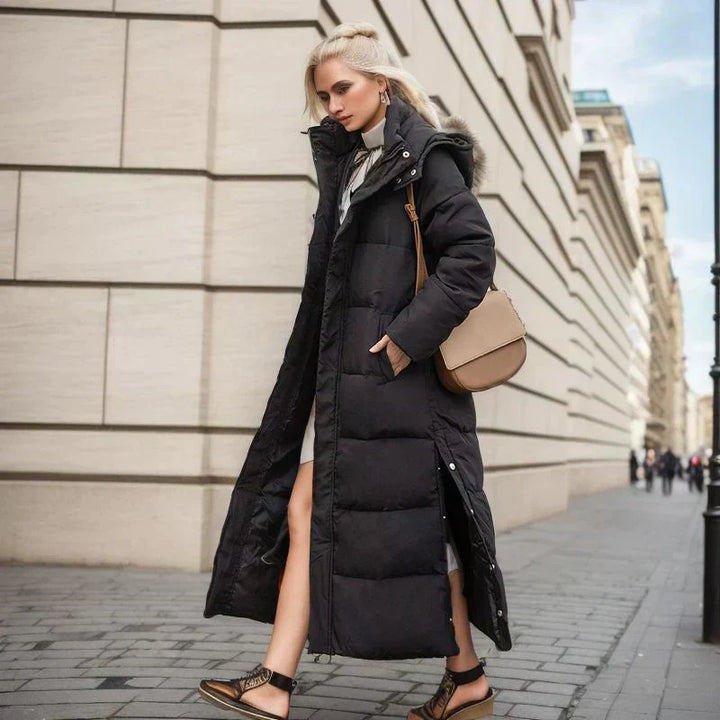 Women's elegant long winter coat, designed for warmth and stylish cold-weather comfort.