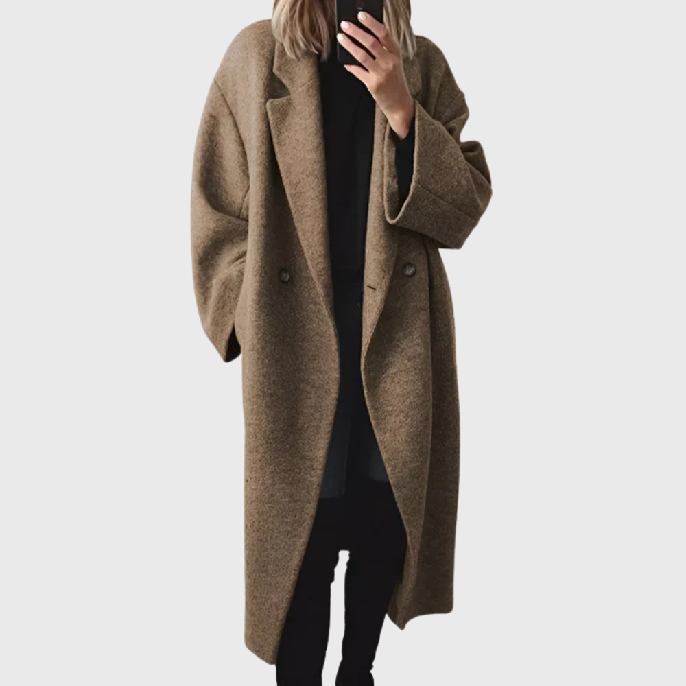 Cozy women's longline overcoat with an oversized fit, perfect as a casual or elegant dress coat for winter.