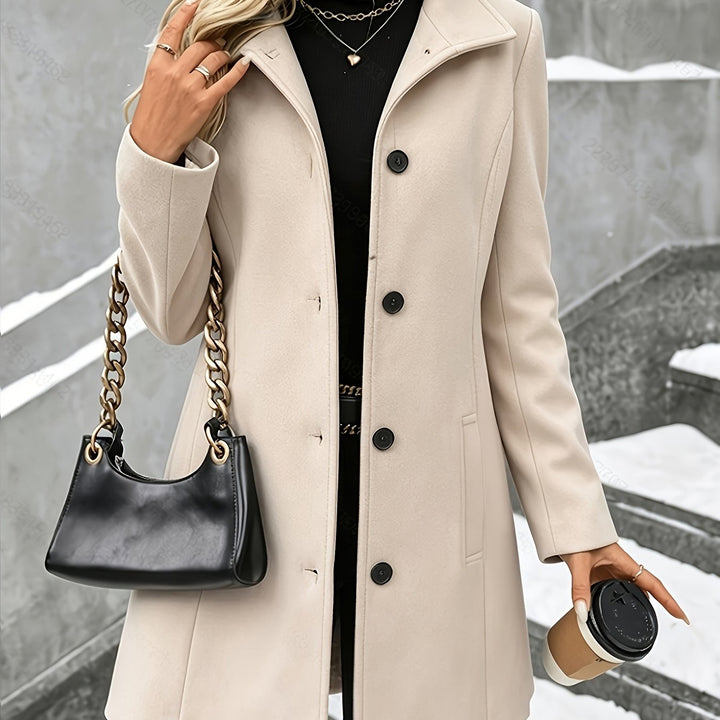 Elegant women's longline winter coat, featuring a classic notch collar and single-breasted design.