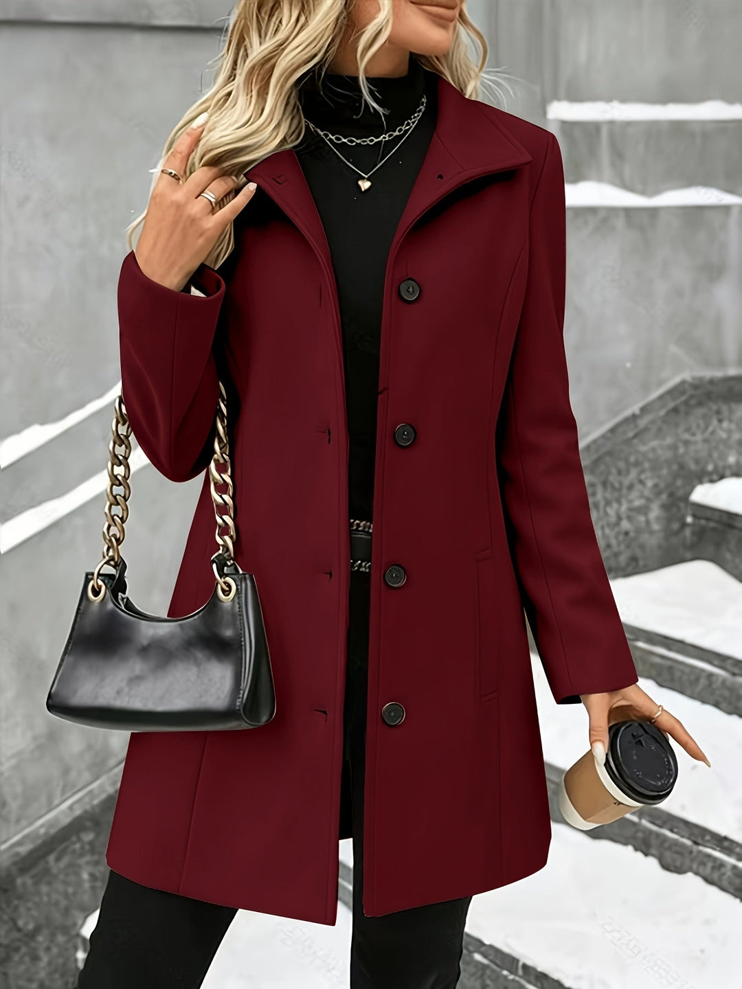 Sophisticated women's longline coat featuring a chic notch collar, great for elegant fall outerwear.