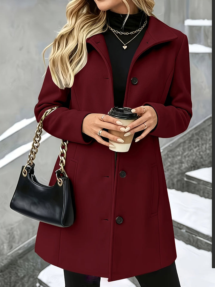 Wool blend women's longline winter coat, single-breasted with notch collar, for elegant fall fashion.