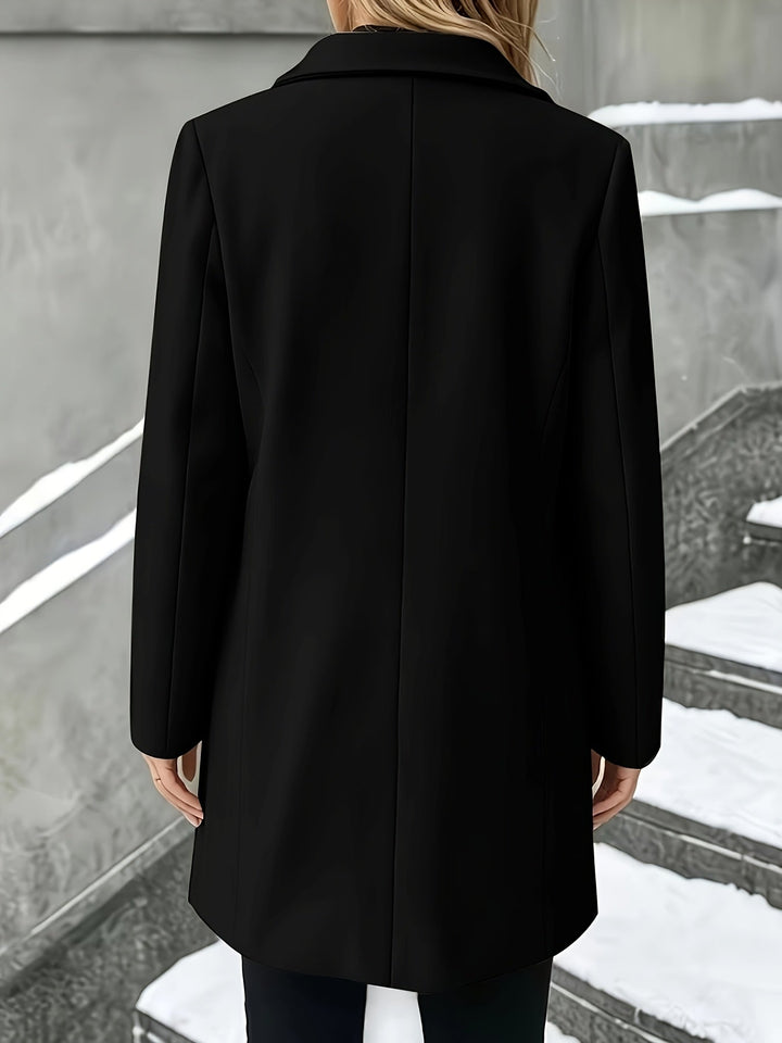 Full-length women's elegant longline winter coat, single-breasted with sophisticated notch collar.