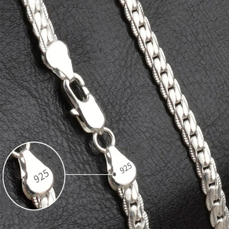 Elegant women's lucky charm pendant necklace with a gold-tone chain, a timeless fashion accessory for her.