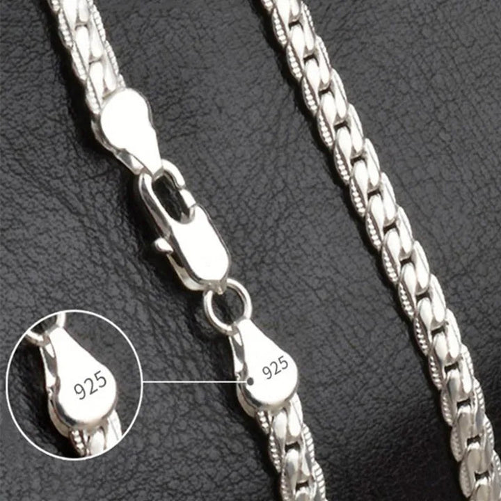 Elegant women's lucky charm pendant necklace with a gold-tone chain, a timeless fashion accessory for her.