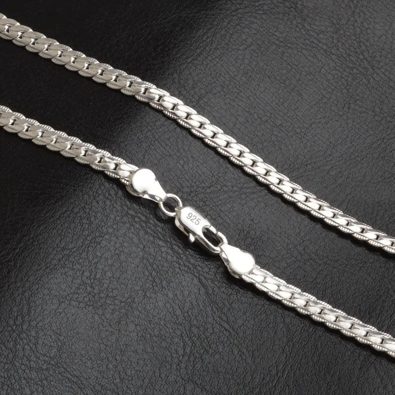 Model wearing a stylish lucky charm pendant necklace, showcasing its elegance as a women's jewelry piece.