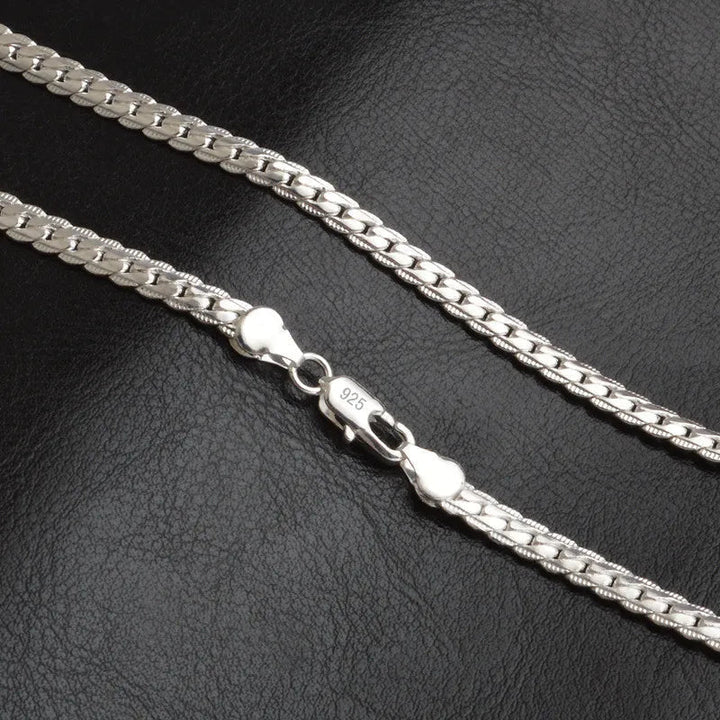 Model wearing a stylish lucky charm pendant necklace, showcasing its elegance as a women's jewelry piece.