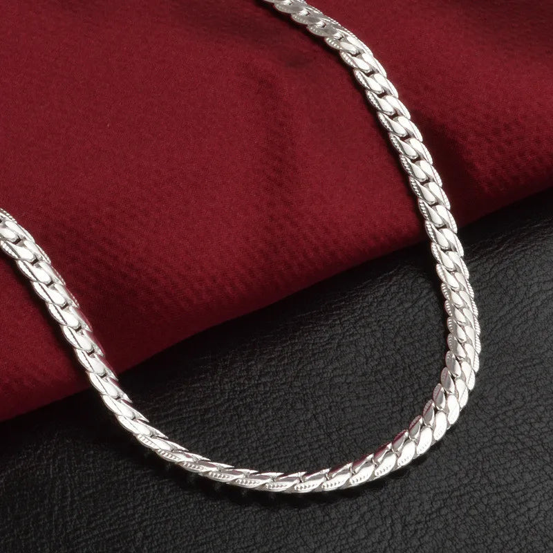 Gold-tone women's elegant lucky charm pendant necklace, a timeless accessory to elevate any outfit.